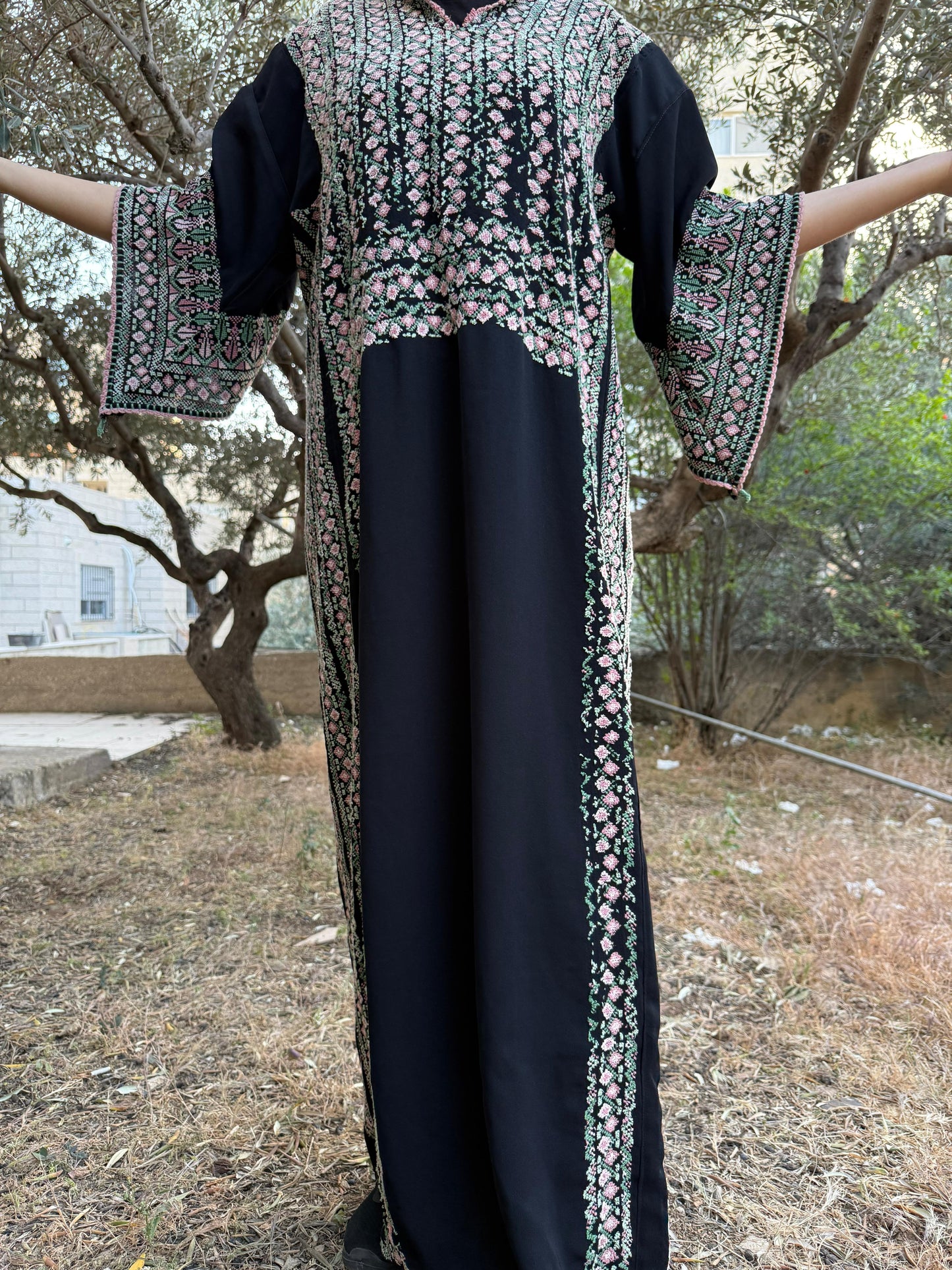 Handwoven Palestinian Thobe – Black with Colorful Tatreez