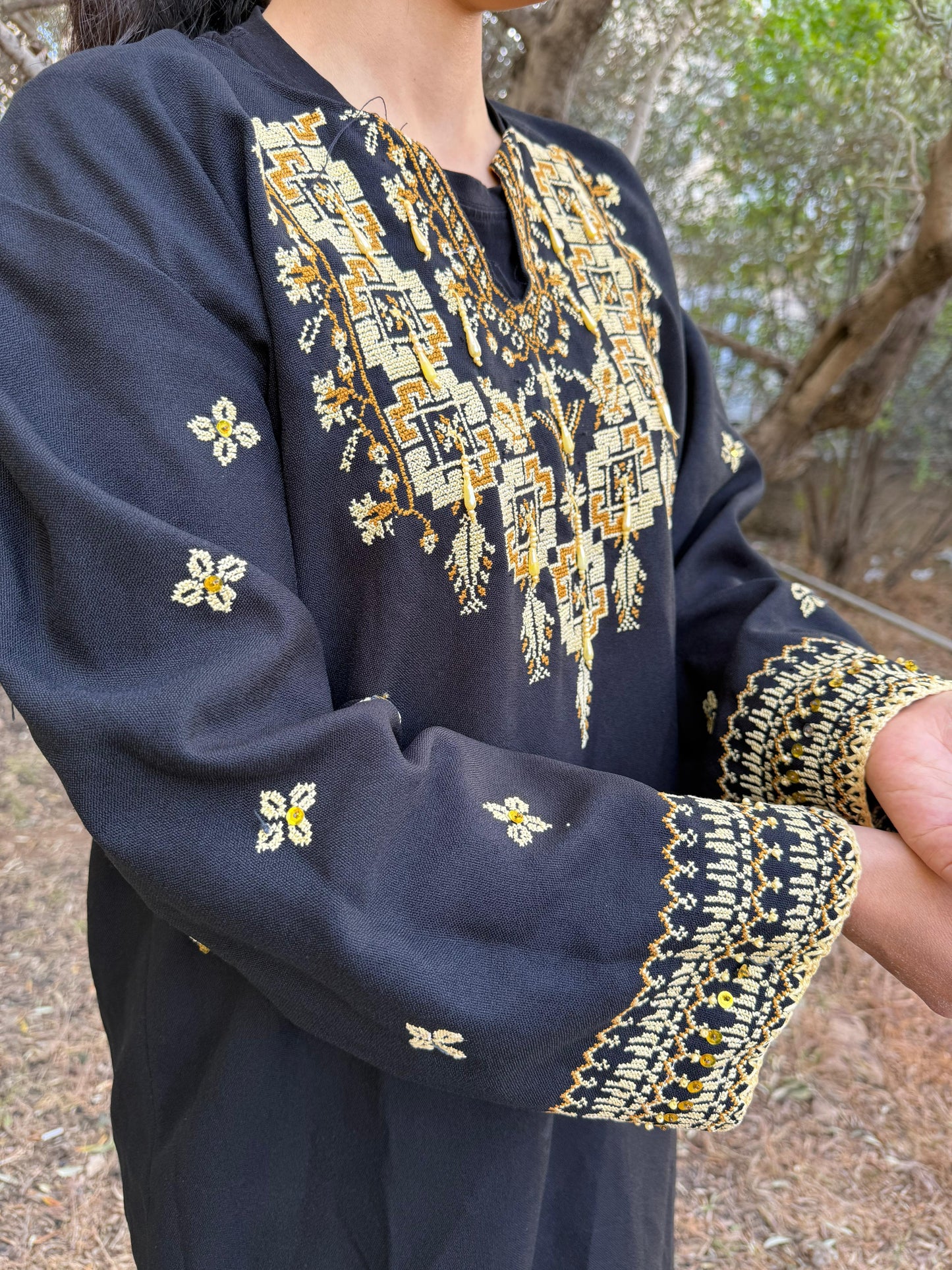 Handwoven Thobe – Black with Exceptional Yellow Tatreez